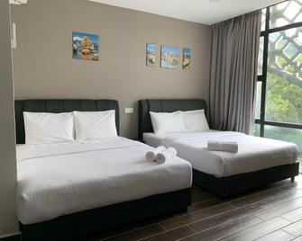 Hotel Mutiara - Gua Musang - Camera da letto