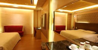 فندق آر 7 إكو - مدينة كاوهسيونغ - غرفة نوم