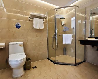 Greentree Inn Hunan Jishou Longshan Yuelu Avenue Business Hotel - Enshi - Bedroom