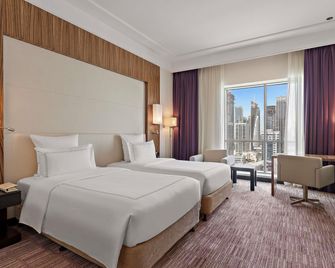 Pullman Dubai Jumeirah Lakes Towers - Hotel & Residence - Dubai - Camera da letto
