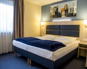 فندق رودلهايمر هوف أم فاسرتورم - فرانكفورت ام ماين - غرفة نوم