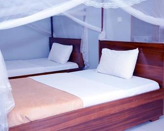 Jaguar Hotel Kampala - Kampala - Schlafzimmer
