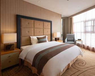Xinhua Jianguo Hotel - Jiujiang - Quarto