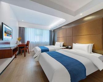 Xiashang Yiting Business Hotel (Xiamen Railway Station Wenzao Metro Station Branch) - Xiamen - Bedroom