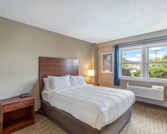 Quality Inn & Suites Gorham Riverside - Gorham - Slaapkamer