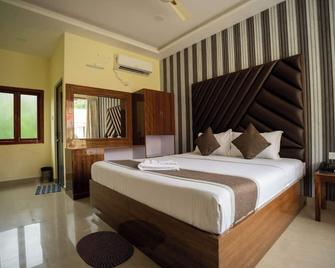 Hotel Neha Palace - Lakshmanpur - Bedroom