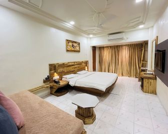 Hotel Shripad - Amrāvati - Bedroom