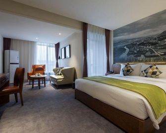 Prolit Hotel (Dazhou Luofu Square Railway Station) - Dazhou - Bedroom