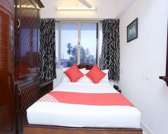 Hotel Galaxy Inn - טריבאנדרום - חדר שינה