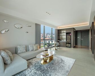 广州美华航空主题酒店 - 廣州 - 客廳