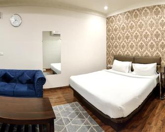 Hotel Minitel Inn - Sultānpur - Bedroom