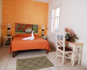 Hotel & Suites Galeria - Morelia - Makuuhuone