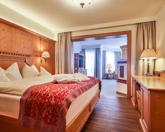 Traumhotel Alpina - Yoga & Ayurveda Adults only - Gerlos - Bedroom