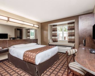 ميكروتل إن آند سويتس باي ويندام ماكون - ماكون - غرفة نوم