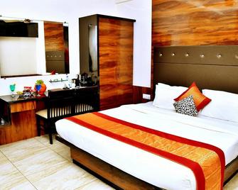 Atharva Hotel - Gulbarga - Bedroom