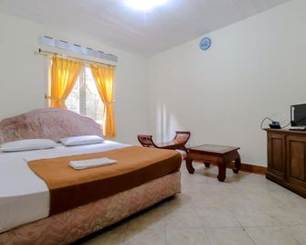 Hotel Kayu Manis - Pakem - Schlafzimmer