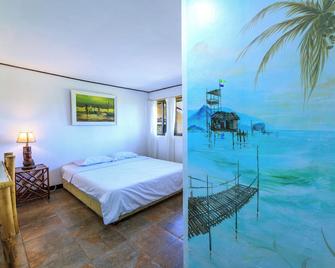 CMDC Private Beach House - Your perfect stay for family or business incentives! - San Juan - Bedroom
