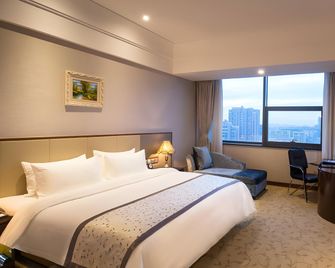 Gloria Plaza Hotel Qingdao - Qingdao - Habitación
