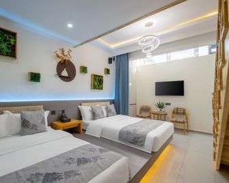 Floral Hotel Rizhao Yunjian Yunshu Homestay - Rizhao - Bedroom