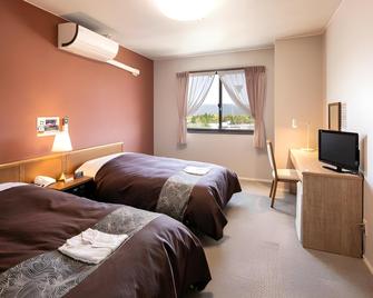 Hotel Suncrown Oaso - Aso - Bedroom