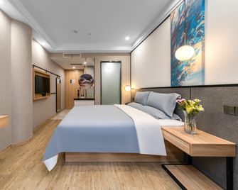 Urban Garden Hotel (Qingdao Hongdao High-tech Fantawild Exhibition) - Qingdao - Bedroom