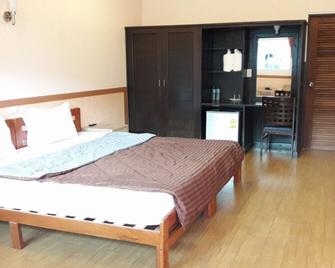 P.N. Hotel - Fang - Habitación