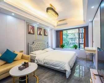 Joy Hotel Apartment (Citic Xiangya South Gate And Xinyuan Subway Station Shop) - Changsha - Bedroom