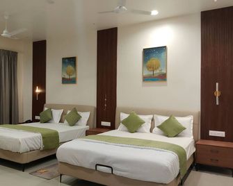 Hotel Mountain Paradise - Mount Abu - Slaapkamer