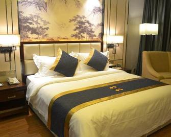 Zhengda Carrey International Hotel - Ťing-čou - Ložnice
