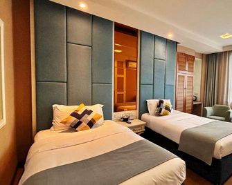 Jinye Jingsheng Hotel (Leshan High-speed Railway Station Jiaxing Road Food Street) - Leshan - Camera da letto