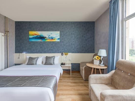 7 Days Inn Tianjin Jintang Main Road Pipe Company Light Rail Station - تيانجين - غرفة نوم