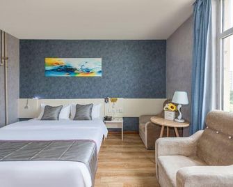 7 Days Inn Tianjin Jintang Main Road Pipe Company Light Rail Station - تيانجين - غرفة نوم