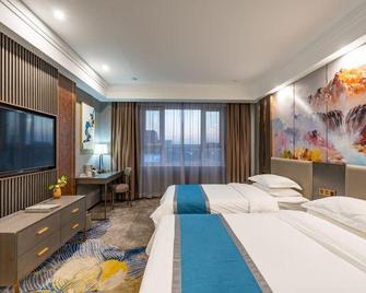 Dingfu Hotel (Urumqi Diwobao International Airport) - Ürümqi - Bedroom
