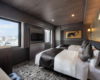 Hotel Kan-Raku Kurume Ekimae - Kurume - Schlafzimmer