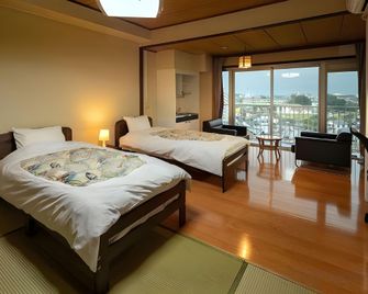 Tamana Onsen Ryuganji Onsen Hotel - Tamana - Bedroom