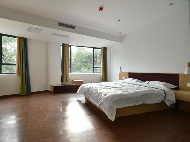 Guilin Ease Hostel - גילין - חדר שינה