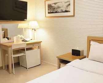 Golden Park Hotel - Ciudad de Jeju - Habitación