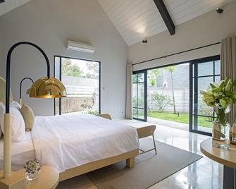 Hanoman Hotel Kota Batu - Batu - Bedroom