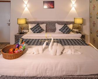 Grand Inara Resort - Sām - Habitación
