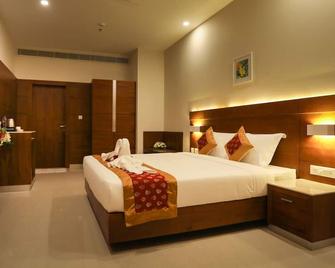 Hotel Kabani Palace - Kotamangalam - Camera da letto
