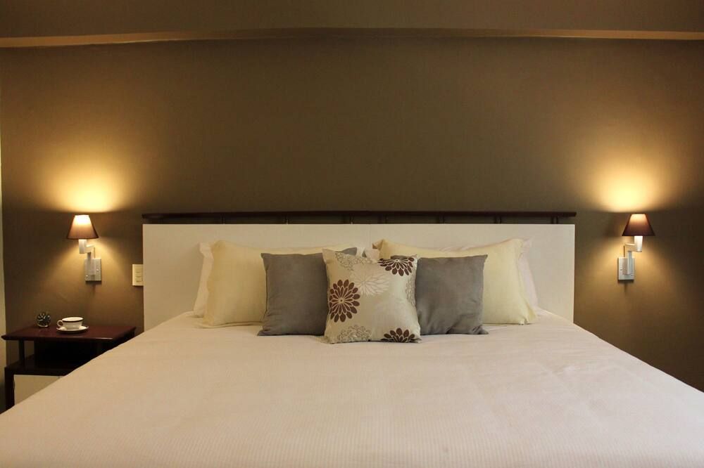 Entre Patios Hotel Boutique - לאון - חדר שינה