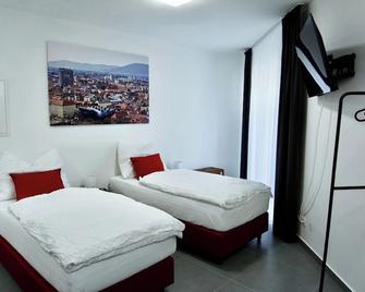 Grazora Living Apartments - Graz - Schlafzimmer