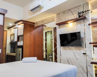 Homey and Comfy Studio at Vida View Makasar Apartment - Ujung Pandang - Chambre