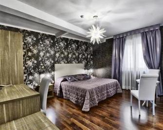 Hotel Mastrodattia - Celano - Спальня