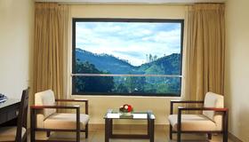 Clouds Valley Leisure Hotel - Munnar - Phòng ngủ