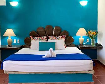 سويتس بلازا ديل ريو - فاميلي هوتل ماليكون سنترو - بورتو فولارتا - غرفة نوم