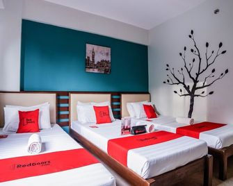 RedDoorz Plus near Rizal Junction - Puerto Princesa - Ložnice