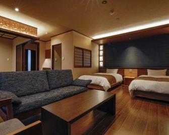 Hotel Shikimi - Takachiho - Slaapkamer