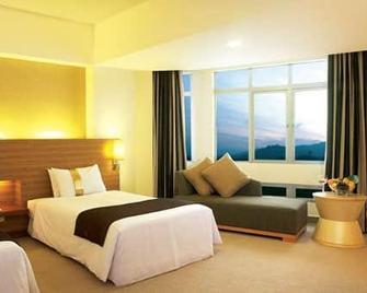 Hotel Rose International - Nilambur - Camera da letto