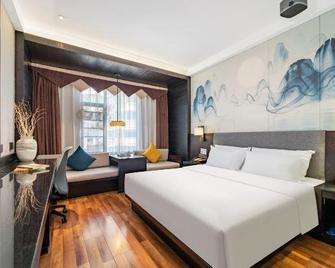 Crystal Pudi Hotel (Jingdezhen Taoyangli People's Square) - Jingdezhen - Habitación